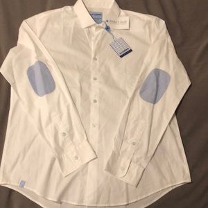 White button down with blue elbow patches. Tags on